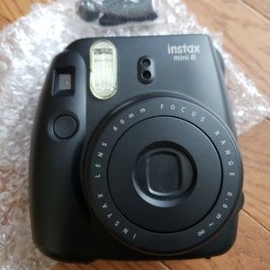 New black polaroid camera